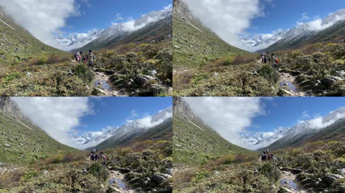 川西高原上，徒步者于云雾间踏雪寻归