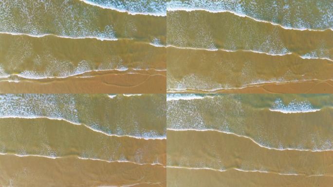 航拍大气磅礴海边海浪拍打沙滩自然风光