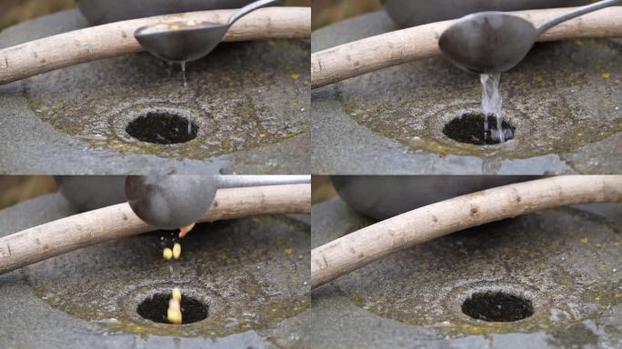 东北农村石磨懒豆腐制作磨豆子