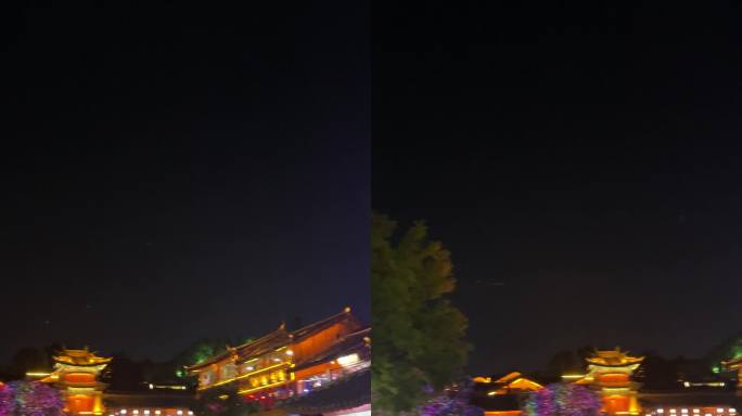 云南丽江古城夜晚商业街道花伞装饰