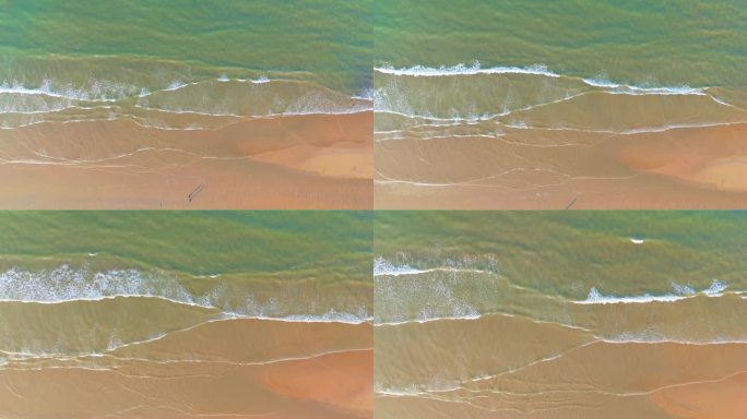 航拍大气磅礴海边海浪拍打沙滩自然风光