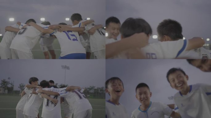 小朋友赢得足球比赛欢呼拥抱