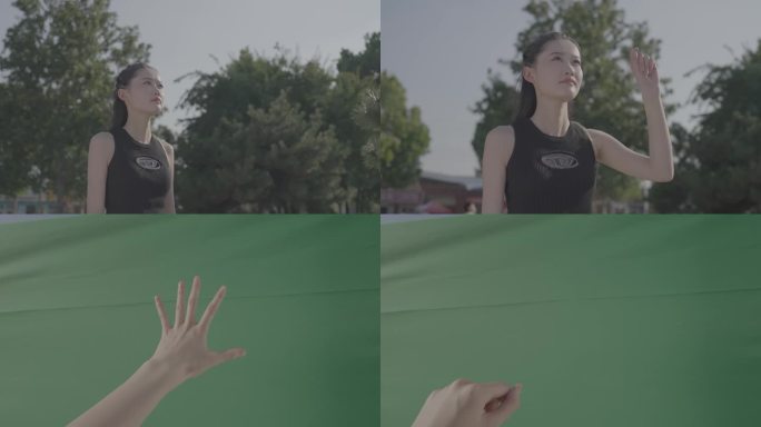 女生在绿色背景前触摸 做手势 绿幕抠像
