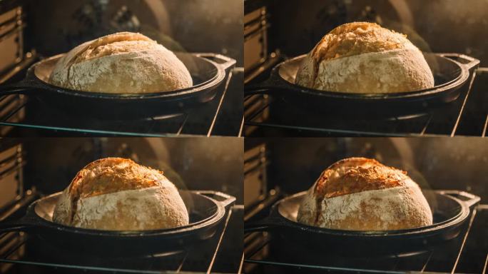 手工酸面包在烤箱中的铸铁锅中发酵和烘烤的延时摄影 – 完美的自制面包。
