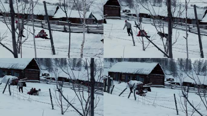 一人拉着坐在轮胎上的小孩在雪地中嬉戏