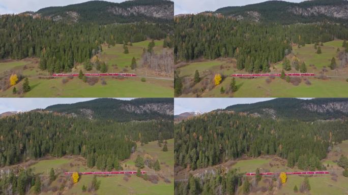 秋季瑞士冰川和伯尔尼纳快车的航拍视角，红色列车穿行其中。