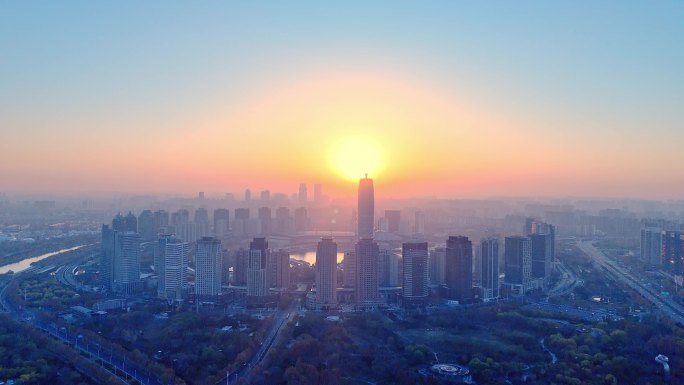 城市日出郑州CBD早晨日出城市街道
