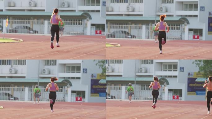 一名女性在跑道上奔跑，背景中有一名男性。