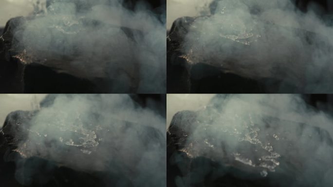 白酒矿泉水流到滚烫的石头上