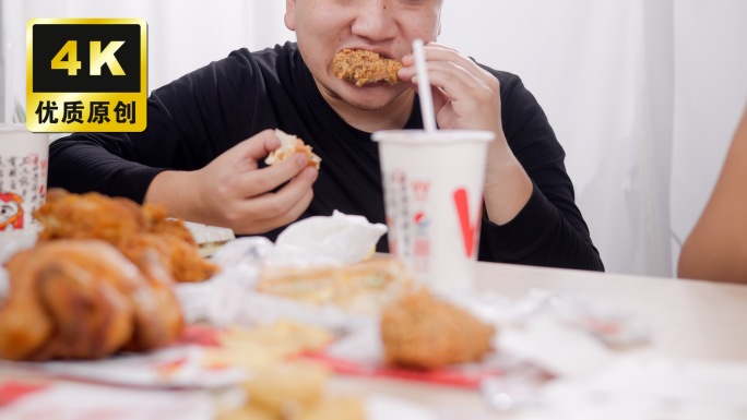 暴饮暴食吃油炸食品高热量狼吞虎咽