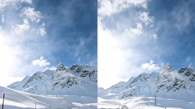 蜿蜒的山路穿过令人惊叹的雪景，提供了冰封山峰的全景视野。