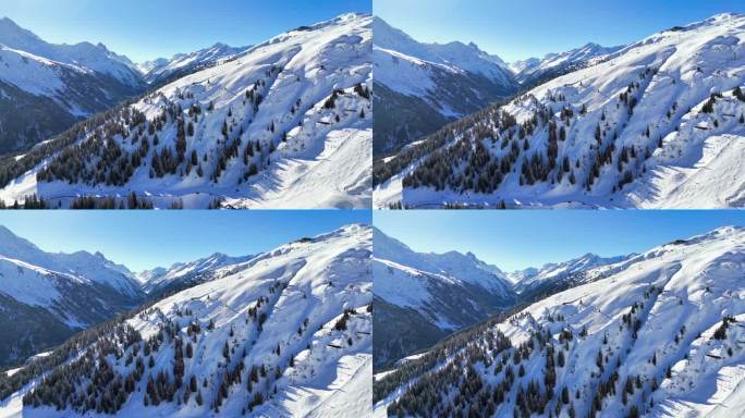 奥地利圣安东阿尔贝格：著名繁忙滑雪胜地的空中视角，位于蒂罗尔阿尔卑斯山。雪覆盖的滑坡和滑雪道，阳光明