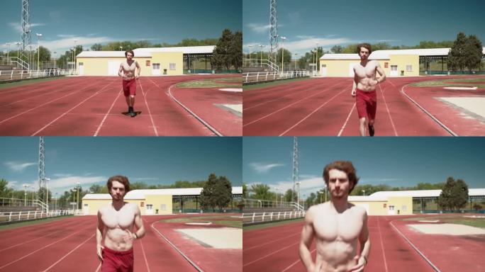 男人在户外跑道上朝镜头跑来。