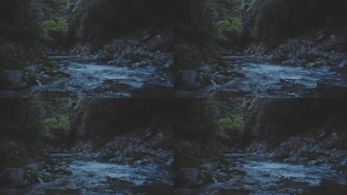 山间河流在傍晚时分流过岩石 - 静态镜头