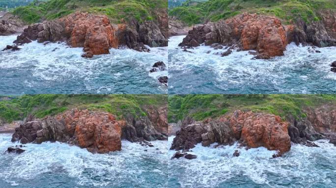 海浪拍打礁石浪花海滩