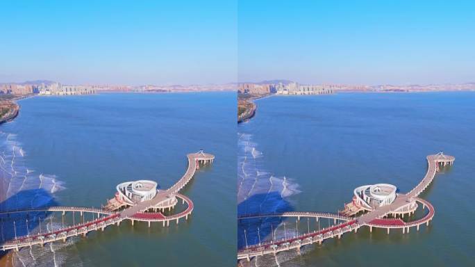 航拍烟台城市开发区天马栈桥滨海建筑风光