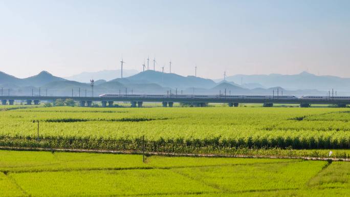 高速铁路动车经过山川田野
