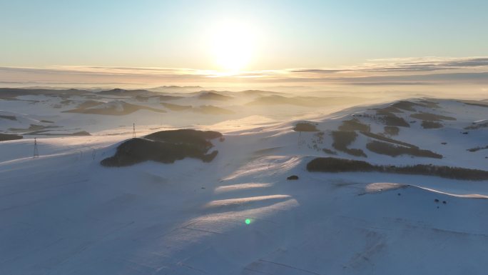 航拍雪域雪原夕阳