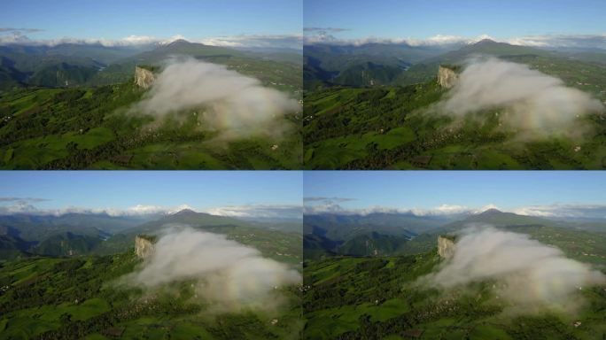 空中拍摄的云移动在绿色山脉在冬季-亚平宁山脉，意大利