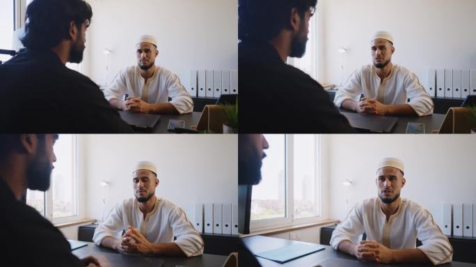 摩洛哥和巴基斯坦的商人在办公室工作。