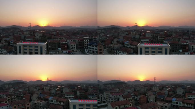 延时航拍夕阳下的农村房屋