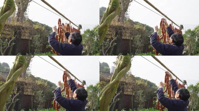 四川香肠晾晒特写川味香肠挂在竹竿上