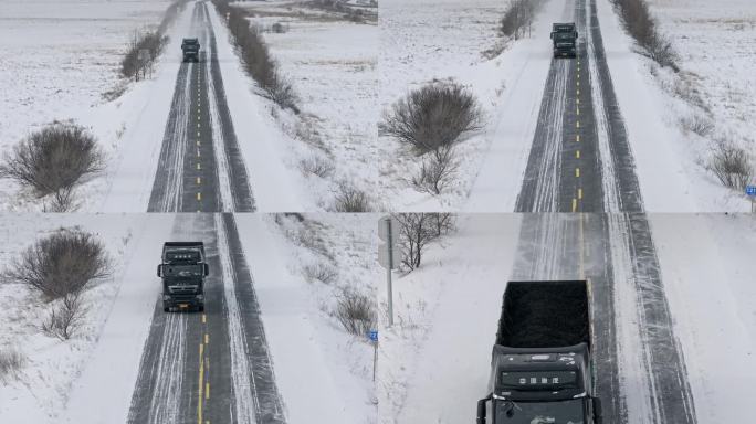 物流运输汽车行驶在冬季飘雪的公路上
