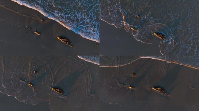 Waves at sunset on the Trengandin beach. Aerial vi