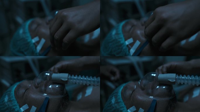 手术后，医院工作人员揭开病人的面罩，没有脉搏