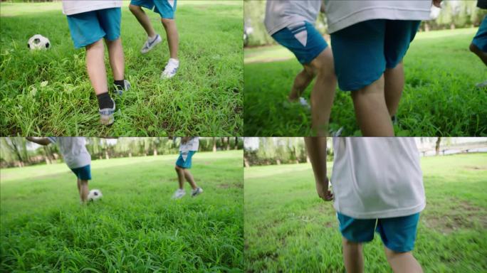 4K 升格 小男孩在草地踢足球