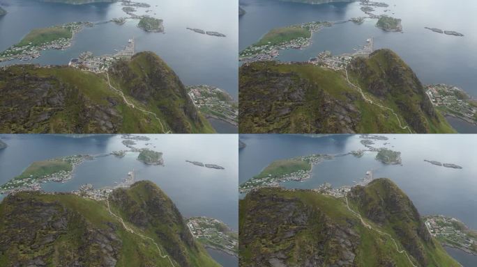 体验令人惊叹的雷纳布林根山的美丽，这是挪威最具标志性的地标之一。这段4K无人机镜头展示了洛福滕群岛的