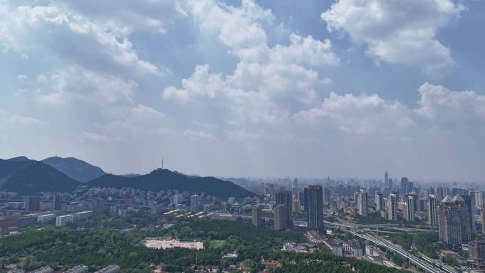 航拍济南二环东路燕子山蓝天白云