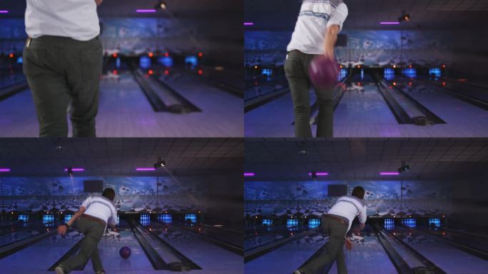 一个年轻人在保龄球馆打保龄球