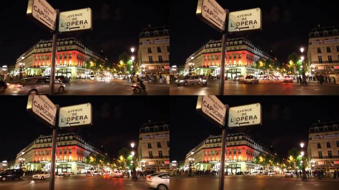 法国巴黎，夜晚街道上的交通，前景中的街道名称标志