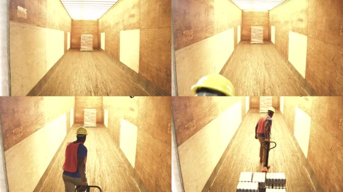 一张工人拉着叉车的三角帆照片