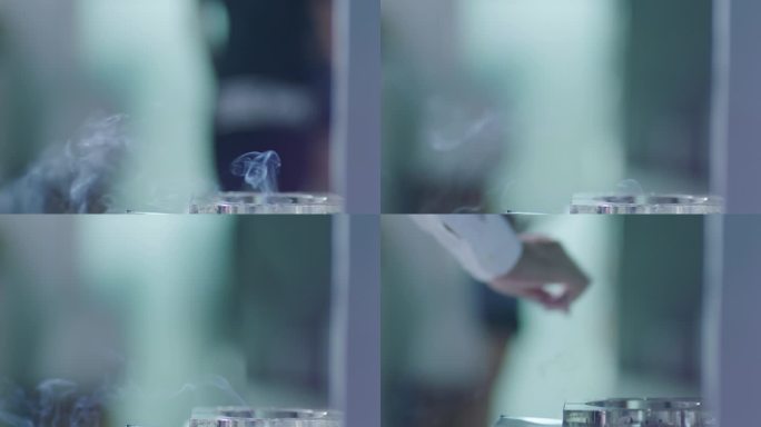 烟灰缸掐灭香烟走开