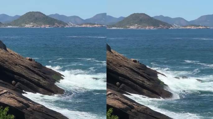 从丛林俯瞰悬崖和海洋中的蓝色波浪，巴西里约热内卢。