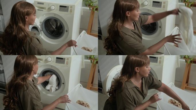 女孩把衣物放进洗衣机里。