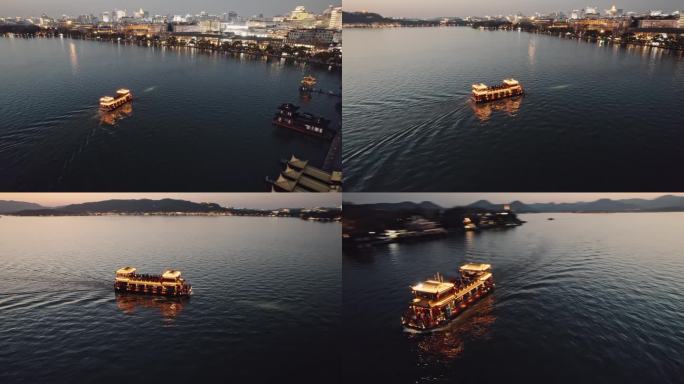 航拍西湖夜景游船