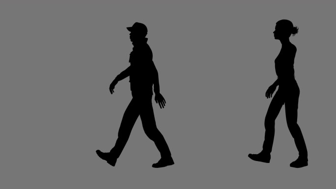 带通道男女人物行进剪影