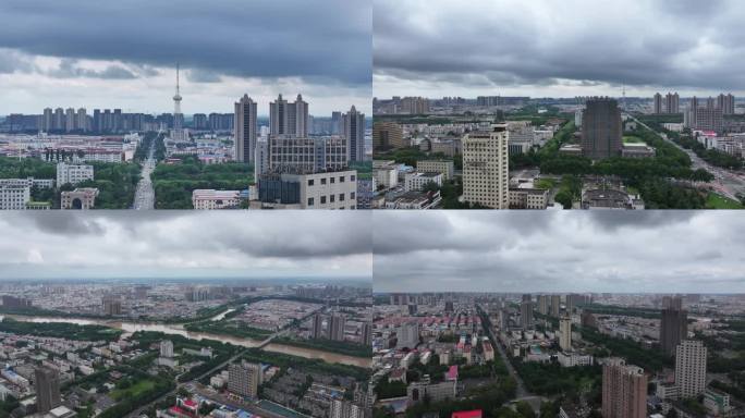 漯河夏季乌云笼罩下的城市建筑