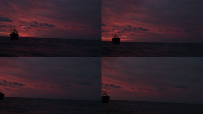 航拍落日余晖下渔船