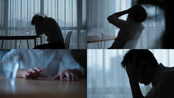 男人窗边烦恼焦虑