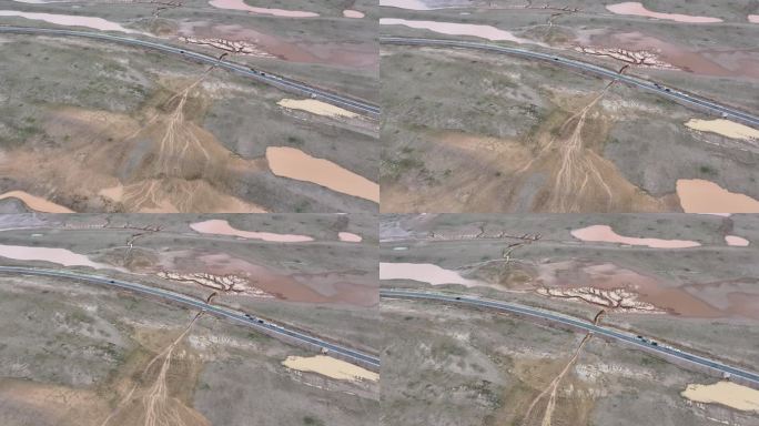 4K公路旁的荒漠湿地景观航拍