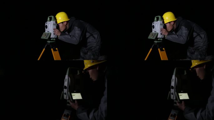 测绘工程师夜间作业 测量员使用全站仪器