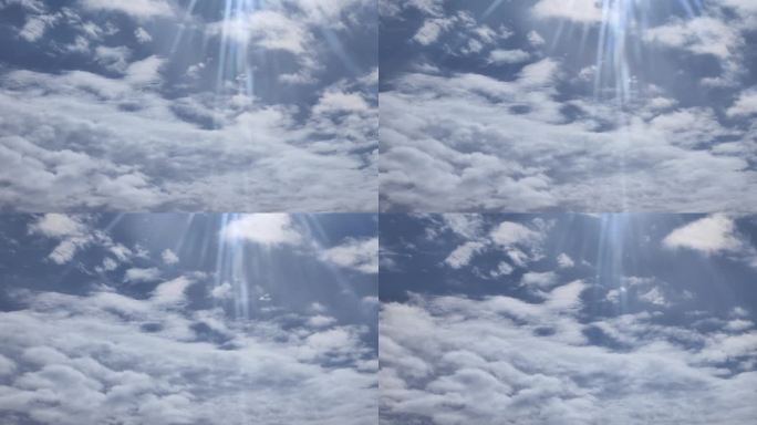 阳光穿透快速移动的云层晴朗天空高清视频