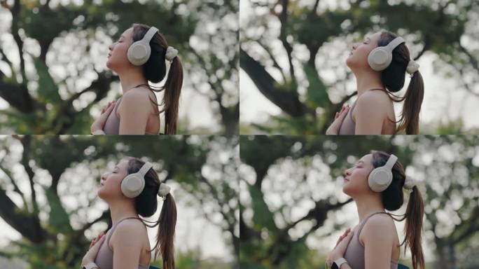 运动女性自然吸气。