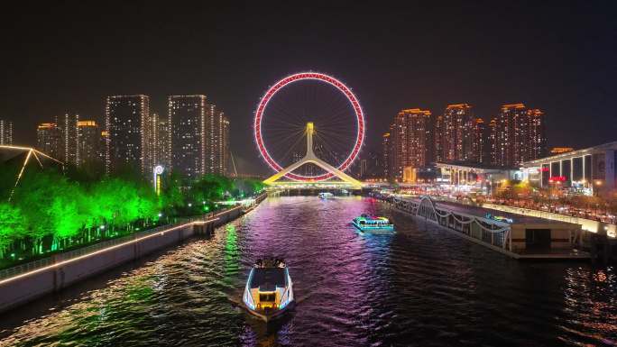 航拍天津海河夜景下的游船