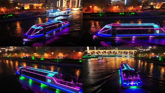 航拍天津海河夜景下的游船