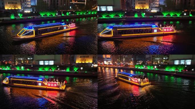 航拍天津海河夜景下的游船